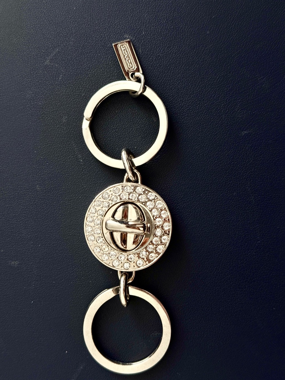 Coach Y2K rhinestone turn lock keychain NWOT